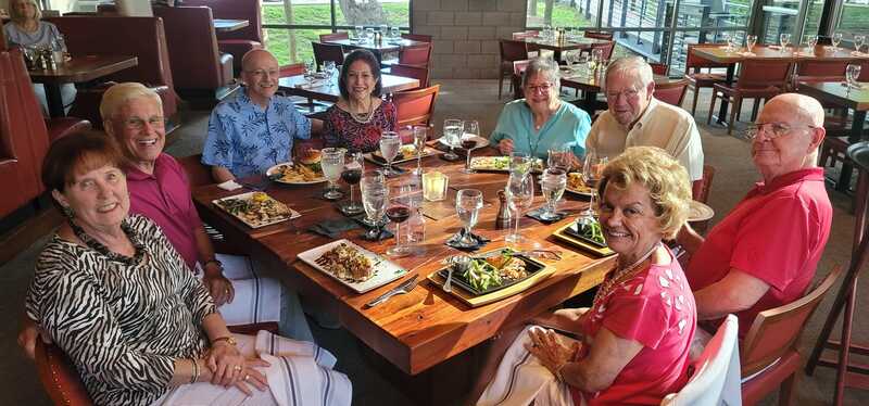 The Dinner Group enjoying a meal together in May at Roaring Fork Stonelake.  