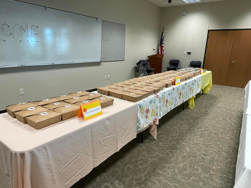 Newcomers provided box lunches from Sweet Lemon as a thank you for members.  