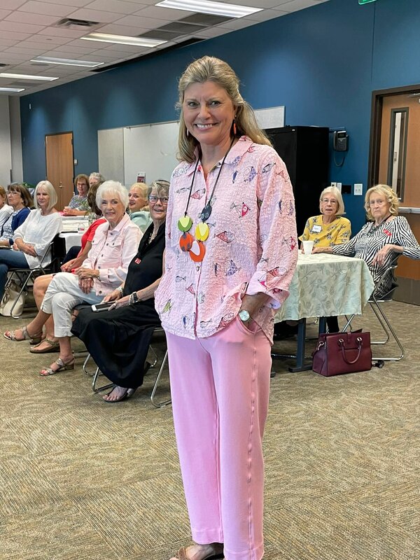 The style show at the May meeting featured clothing from the Pink Poppy.  