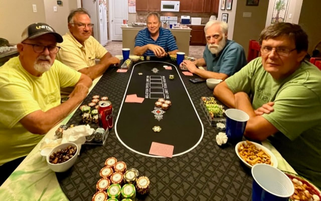 Look how much fun the men are having at poker in June!
