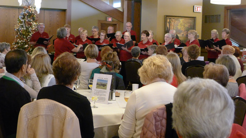 Heritage Oaks Chorus at Dec meeting